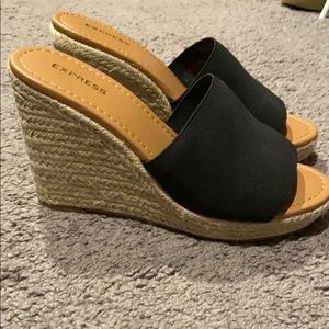 Women’s black express wedges size 7